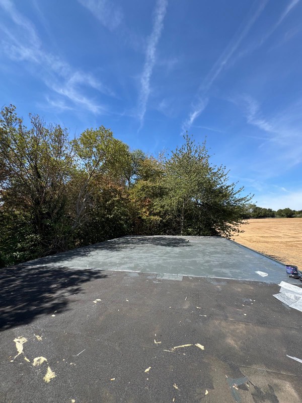 Finished flat roof under clear sky