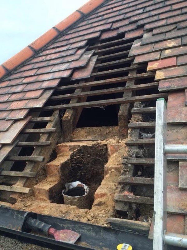 Roof stripped back to the joists during works