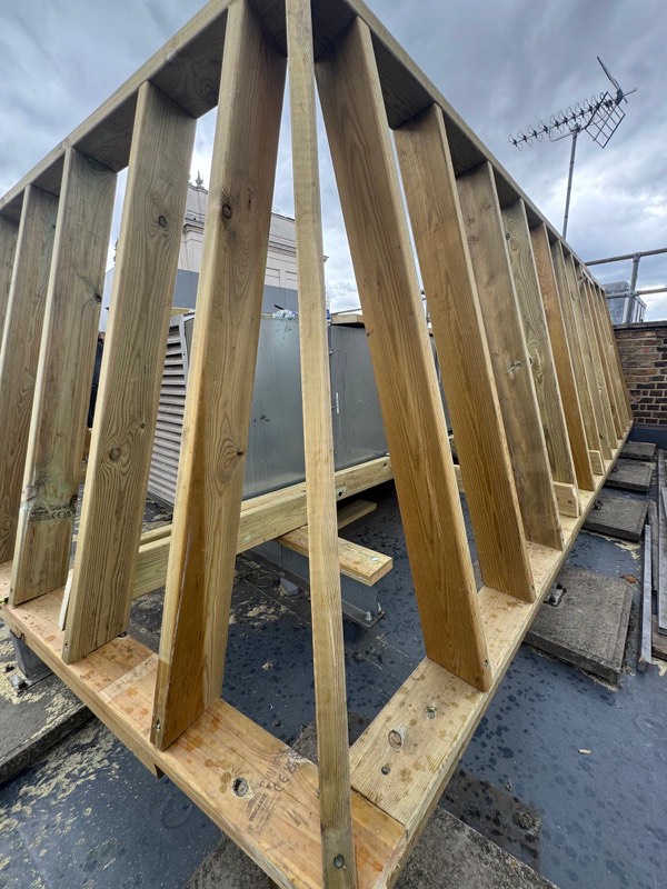 New timber roof structure being built