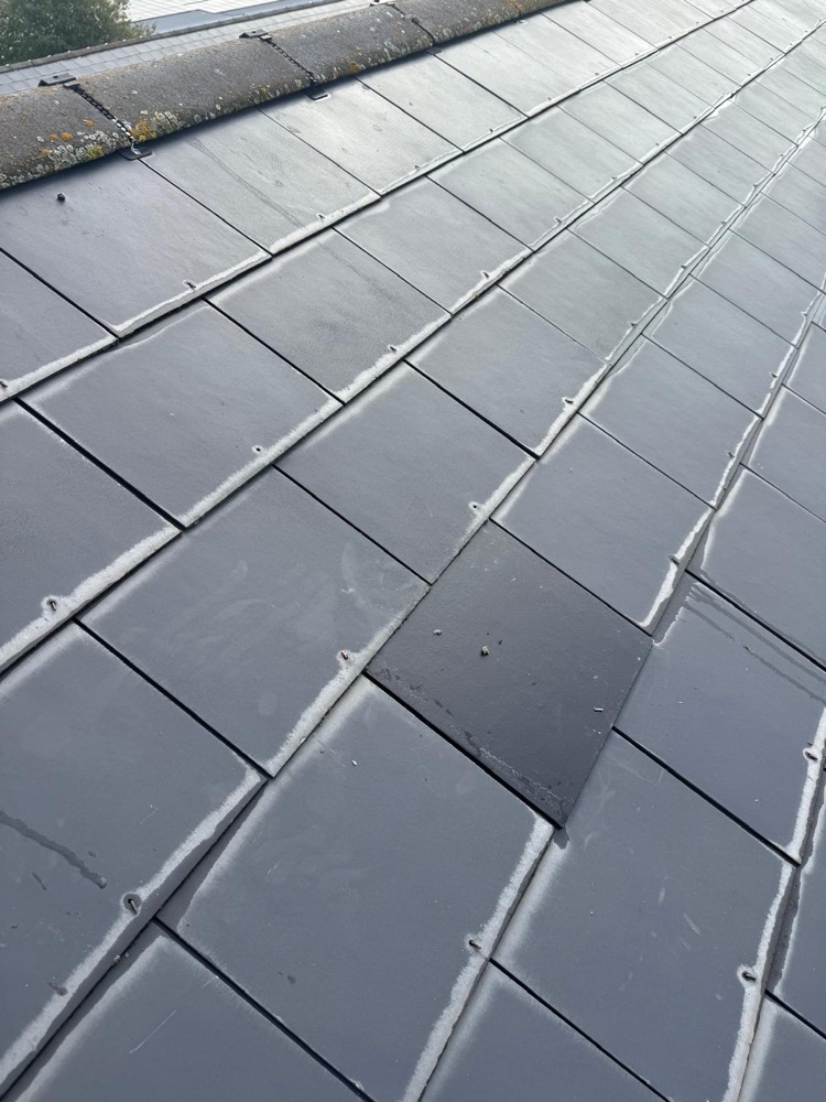 Repaired slate found during a routine roof inspection