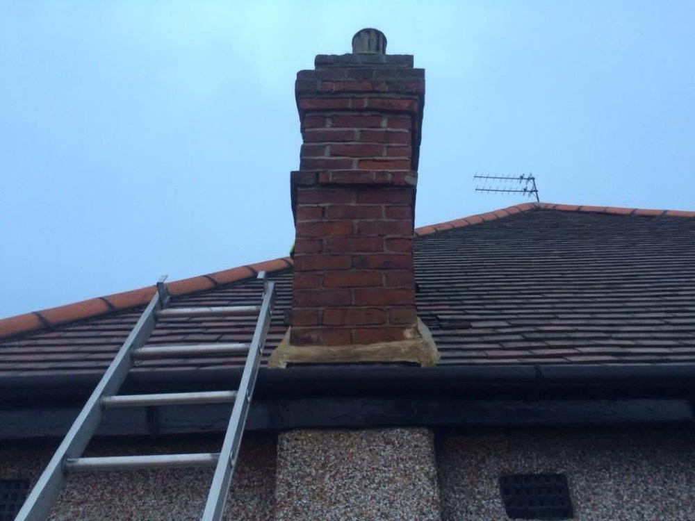 Rebuilt brick chimney stack, completed